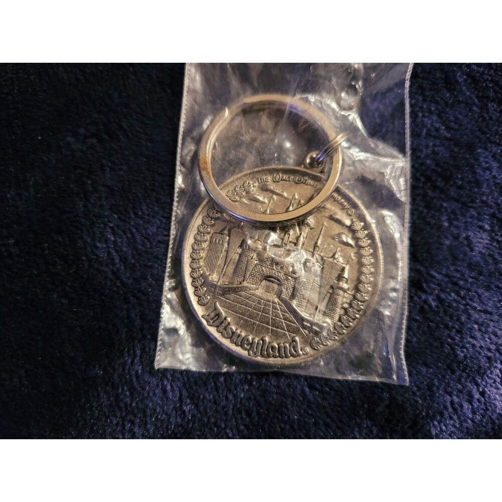 Disneyland Sleeping Beauty Castle Pewter Coin Keychain Heavy Metal Souvenir